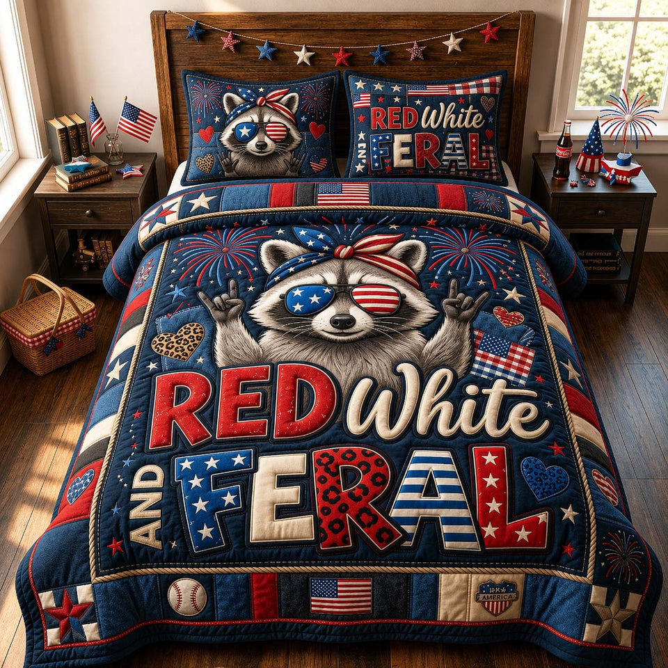 Red White Feral quilted bedding set, quilt and two pillow shams on a made bed