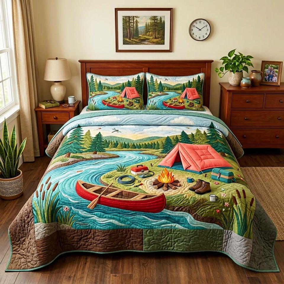 River Camping quilted bedding set, quilt and two pillow shams on a made bed