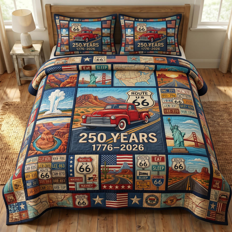 Route 66 Anniversary Stamp Collage quilted bedding set, quilt and two pillow shams on a made bed