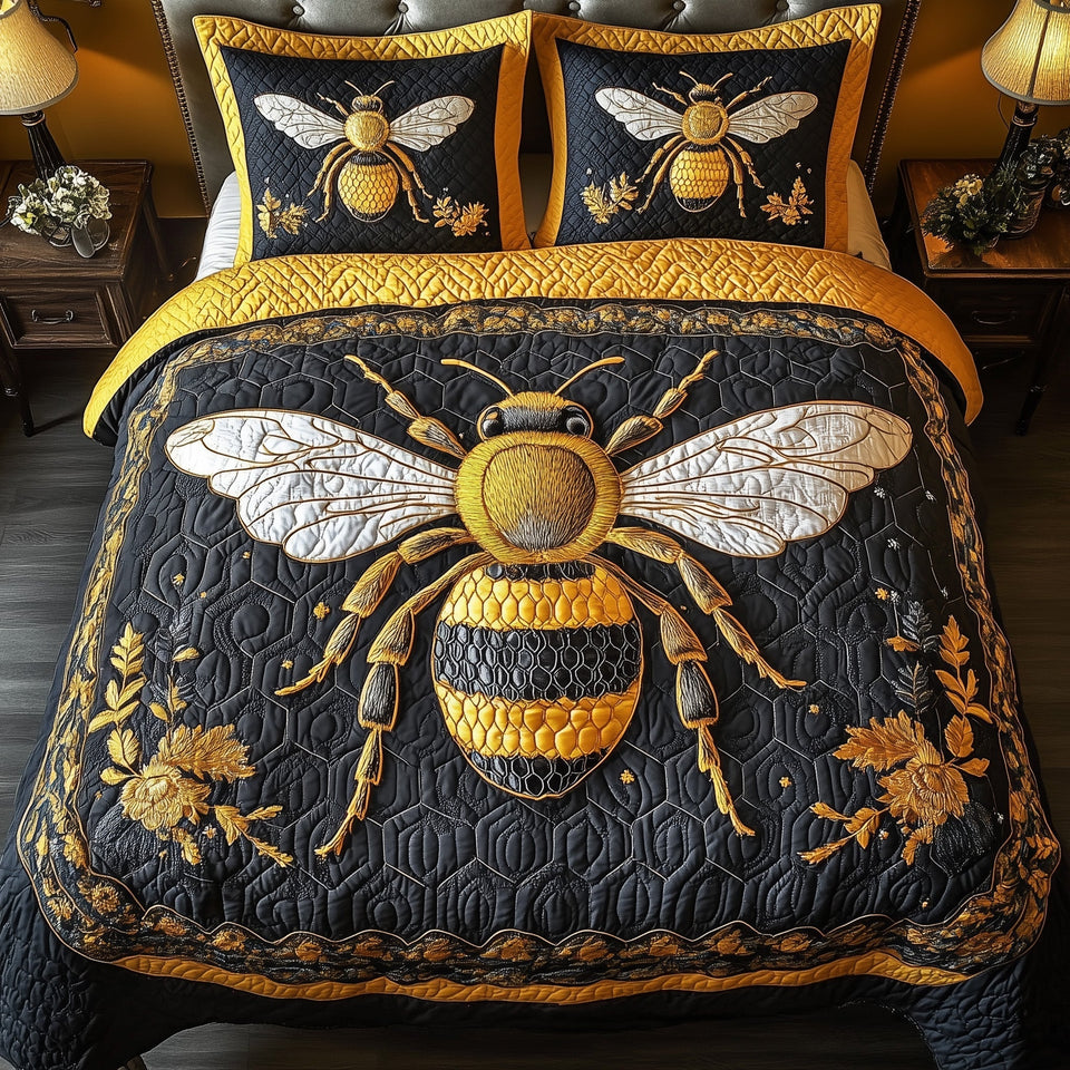 Royal Bee White Wings and Gilt Florals quilted bedding set, quilt and two pillow shams on a made bed