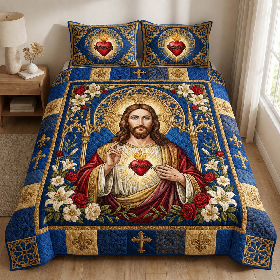 Sacred Heart Of Jesus Blue and Gold Lilies quilted bedding set, quilt and two pillow shams on a made bed