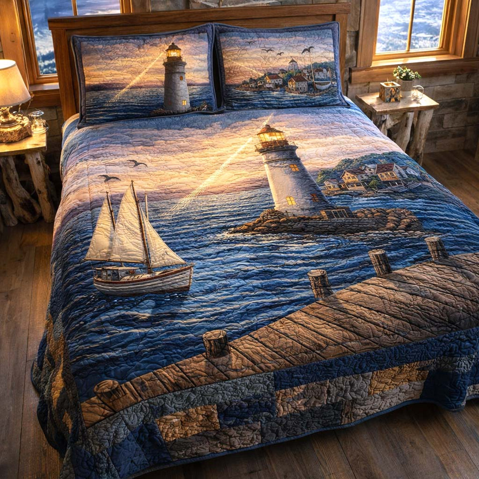 Sailboat Beacon Dusk quilted bedding set, quilt and two pillow shams on a made bed