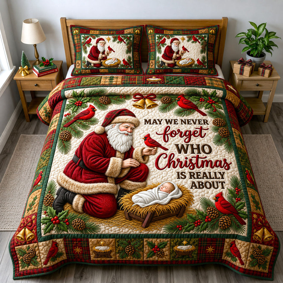 Santa at the Manger quilted bedding set, quilt and two pillow shams on a made bed