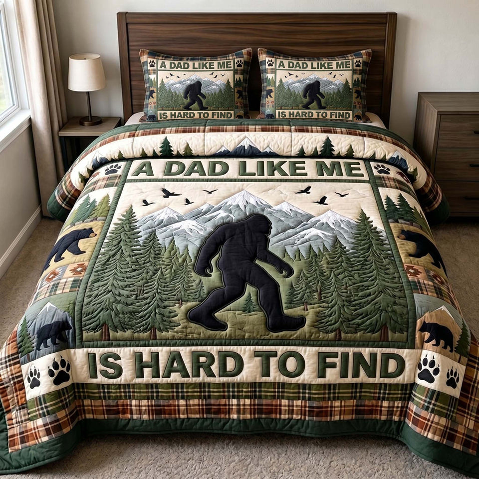 Sasquatch Dad Hard To Find Mountain Trail quilted bedding set, quilt and two pillow shams on a made bed