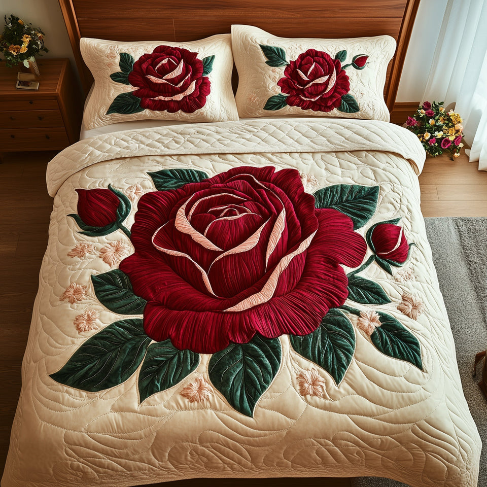 Scarlet Rose Heirloom quilted bedding set, quilt and two pillow shams on a made bed