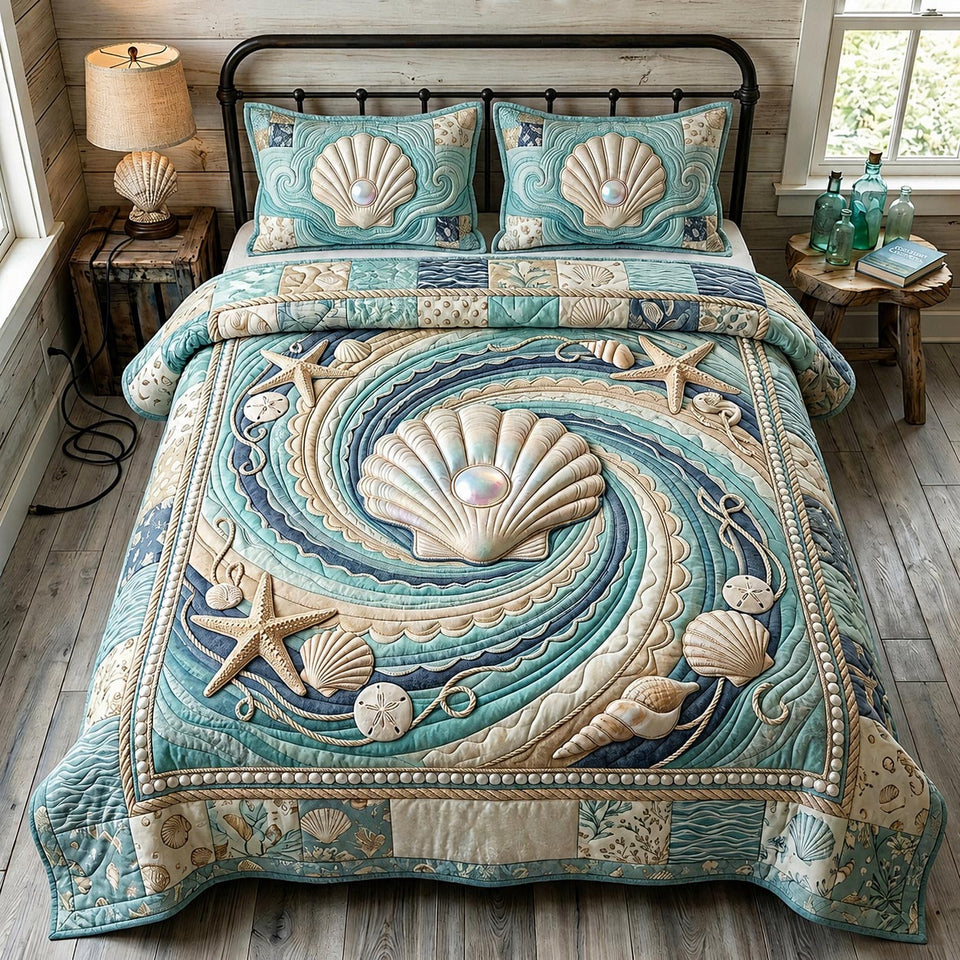 Sea Escape Teal Swirl Shell quilted bedding set, quilt and two pillow shams on a made bed