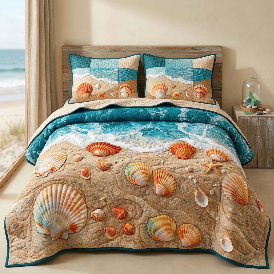 Seashell Beach quilted bedding set, quilt and two pillow shams on a made bed