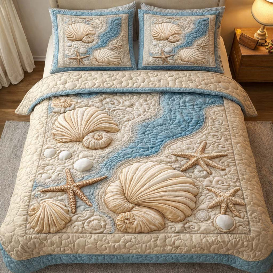 Seashell River quilted bedding set, quilt and two pillow shams on a made bed