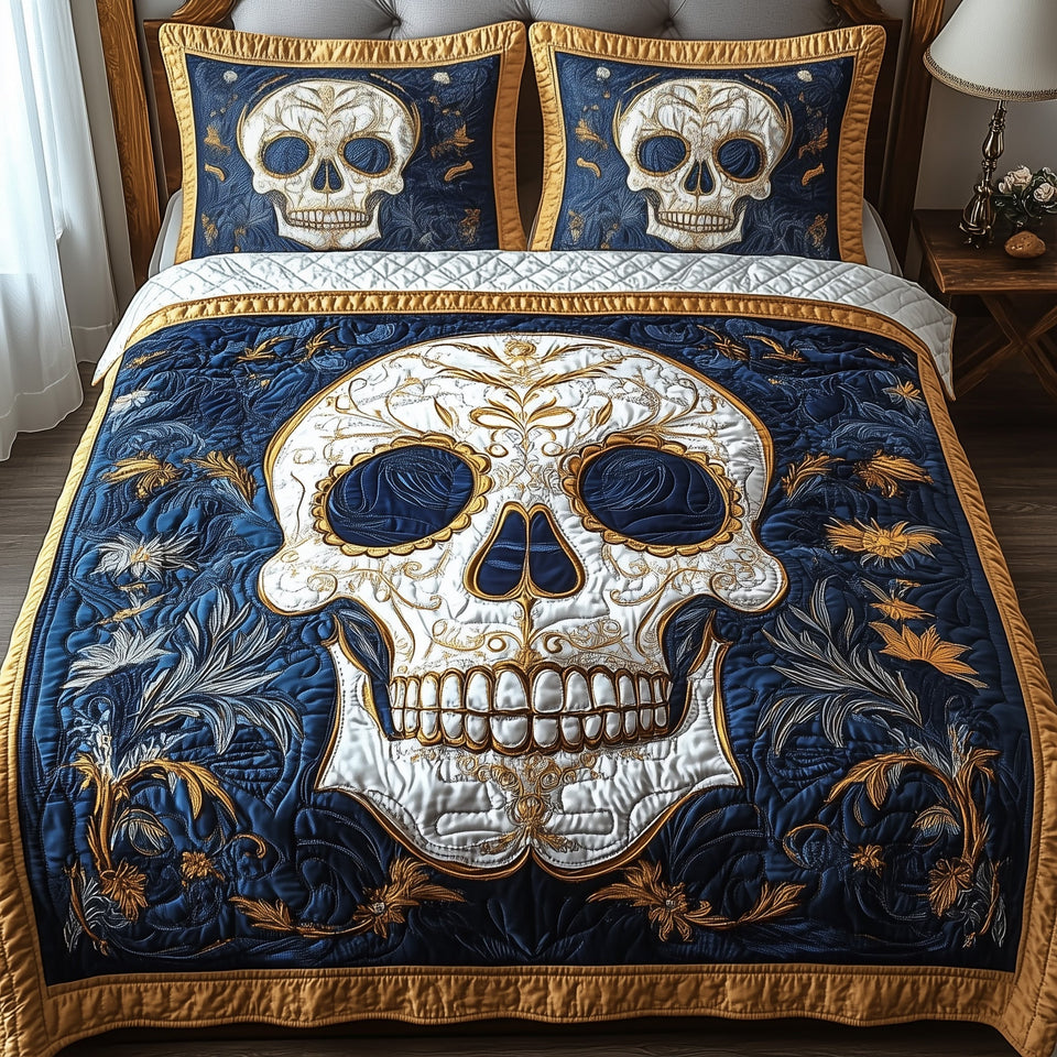 Silver Skull Navy Scrolls quilted bedding set, quilt and two pillow shams on a made bed