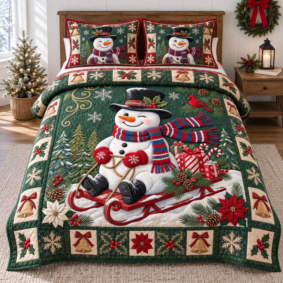 Sledding Snowman quilted bedding set, quilt and two pillow shams on a made bed