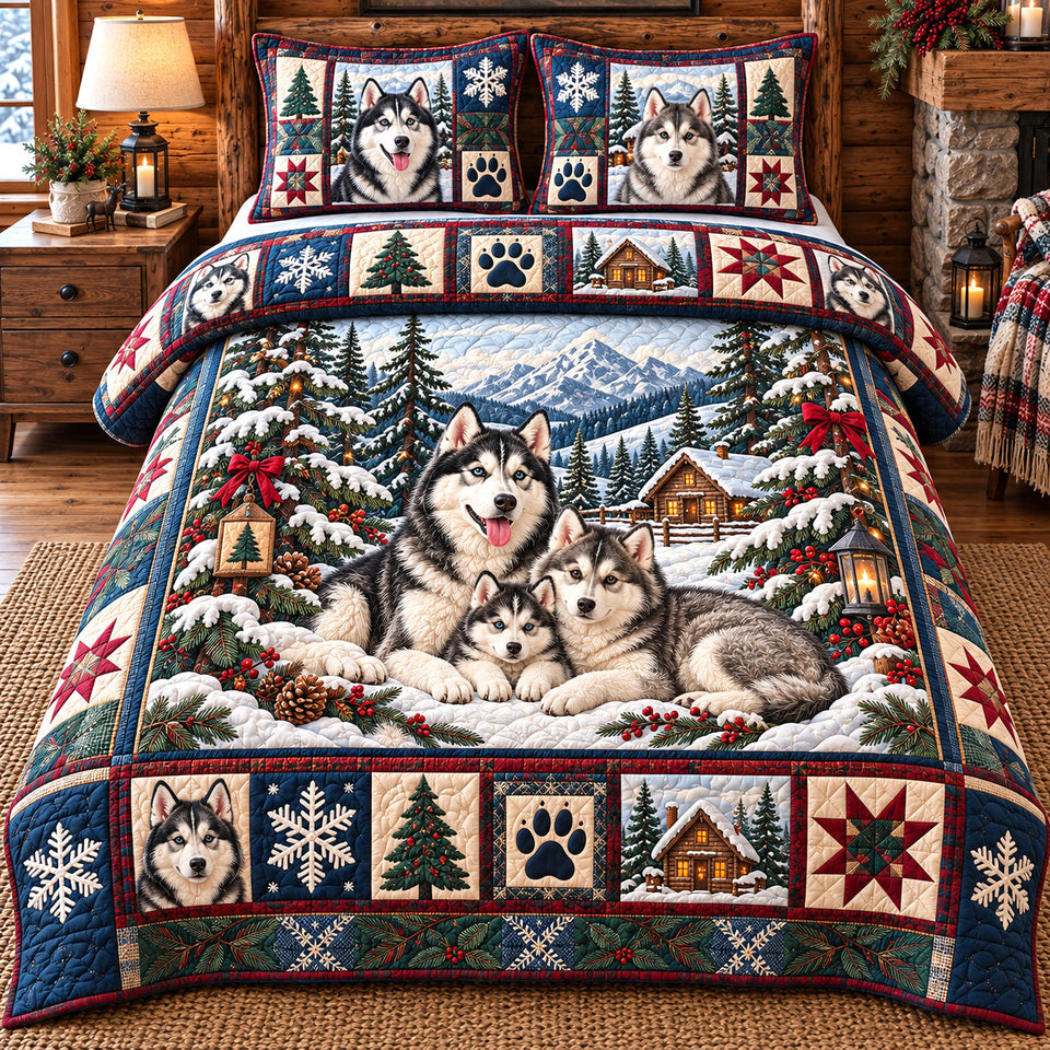 Snowy Husky Family quilted bedding set, quilt and two pillow shams on a made bed