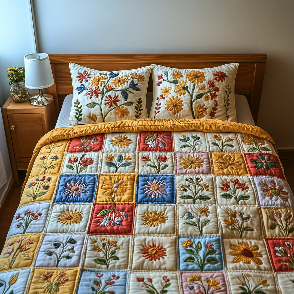 Springtime Patchwork Yellow Bloom Squares quilted bedding set, quilt and two pillow shams on a made bed