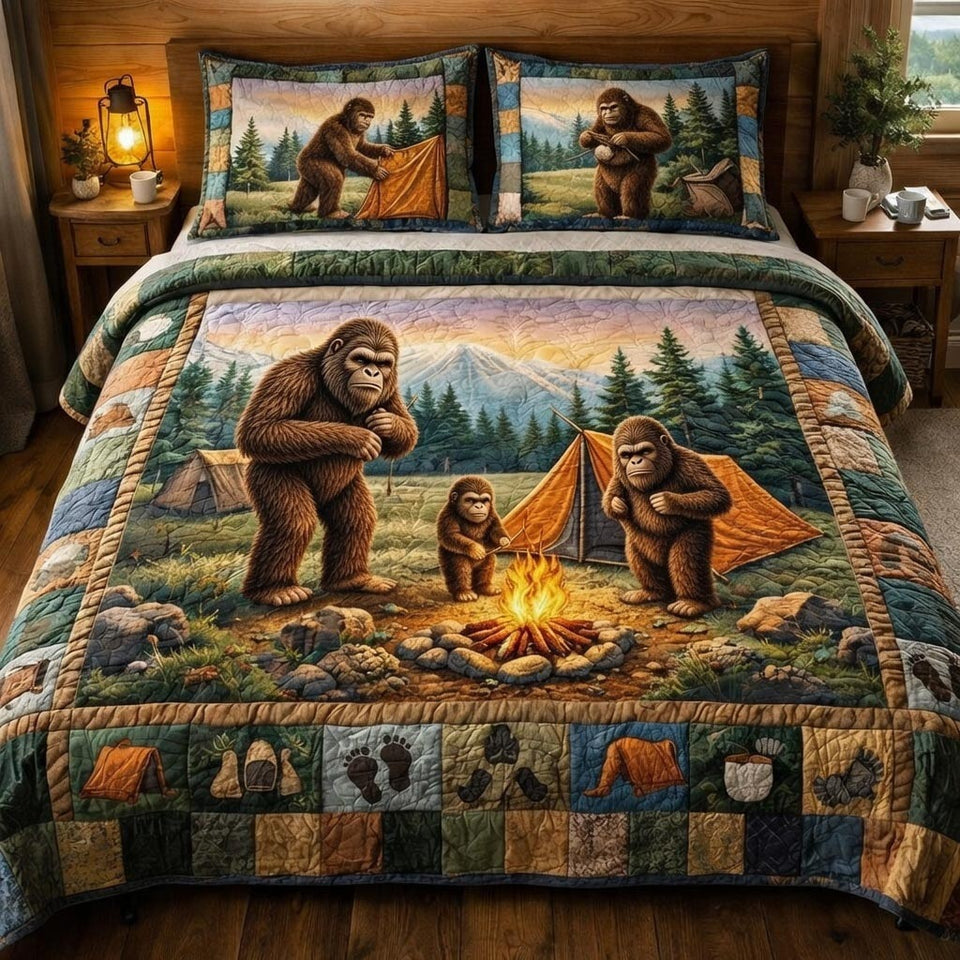Squatch Camp quilted bedding set, quilt and two pillow shams on a made bed