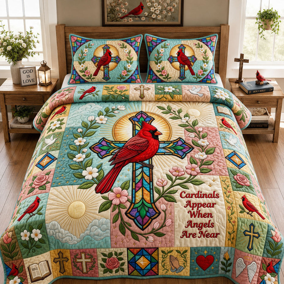 Stained Glass Cross quilted bedding set, quilt and two pillow shams on a made bed