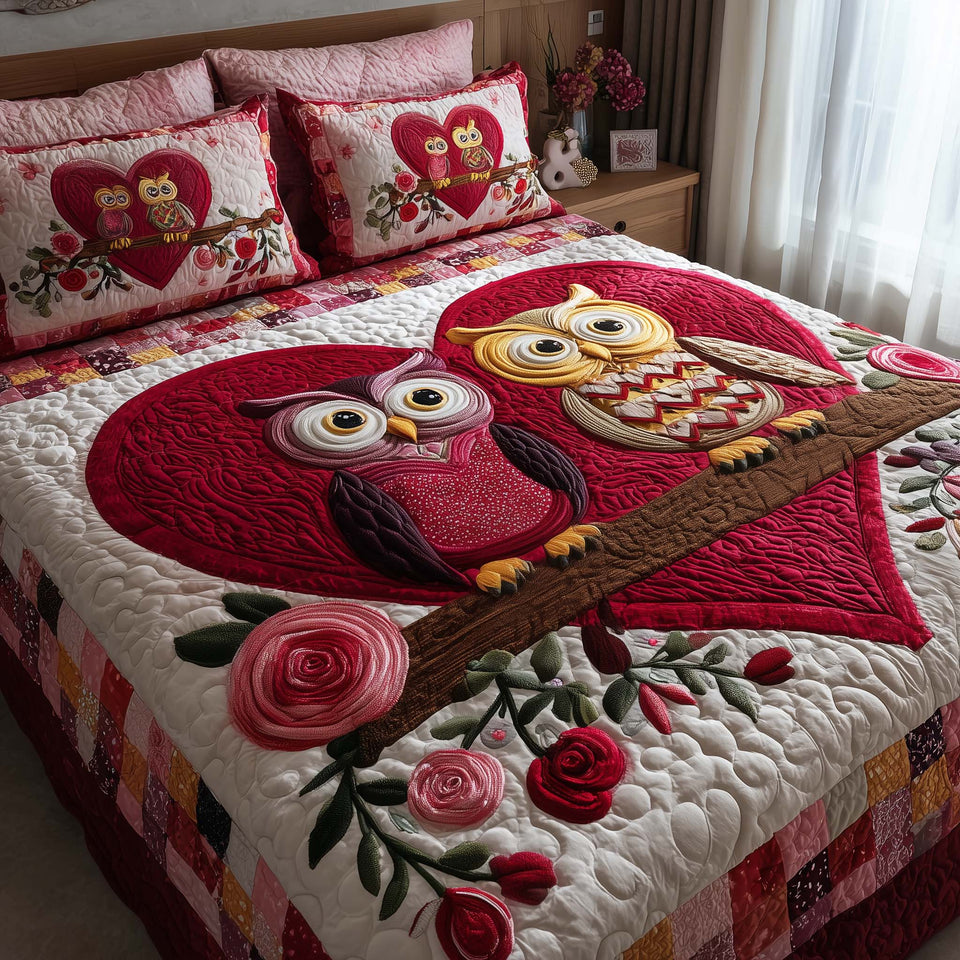 Sweet Union Two Owls on a Branch quilted bedding set, quilt and two pillow shams on a made bed
