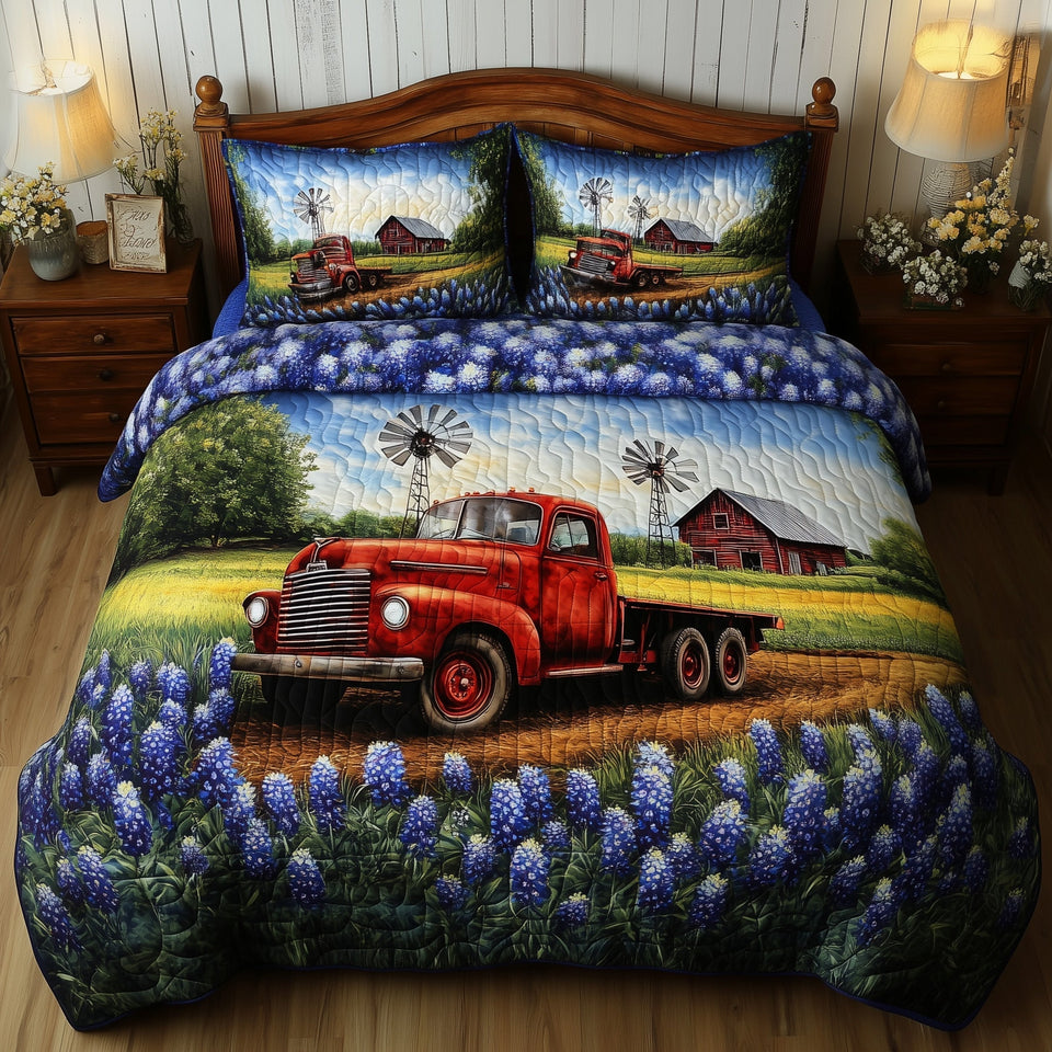 Texas Home Flatbed in the Bluebonnets quilted bedding set, quilt and two pillow shams on a made bed