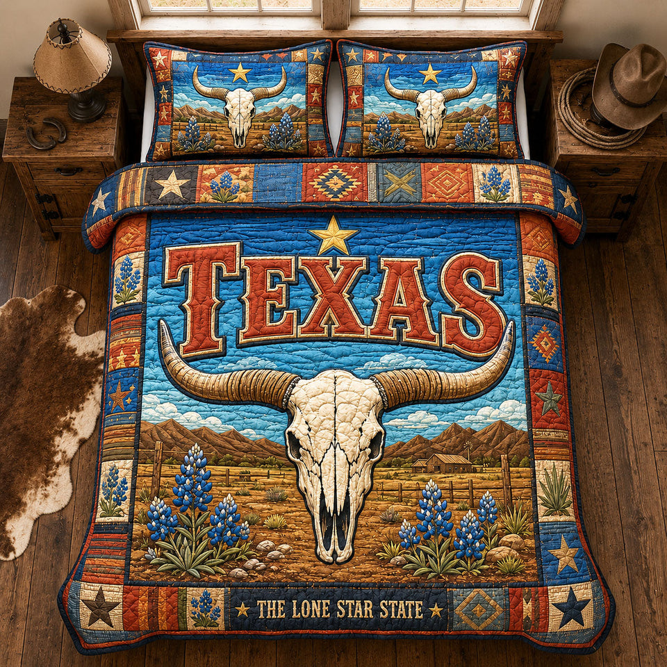 Texas Longhorn Skull quilted bedding set, quilt and two pillow shams on a made bed