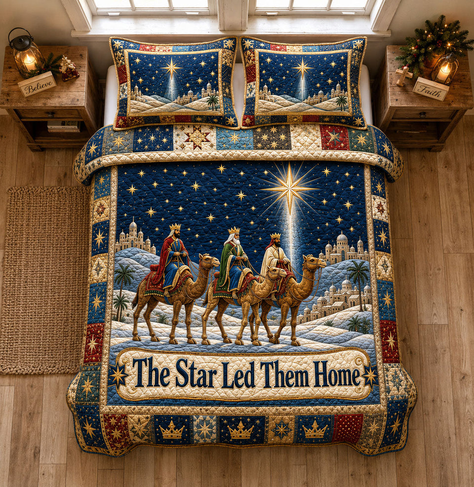 The Star Led Them Home quilted bedding set, quilt and two pillow shams on a made bed