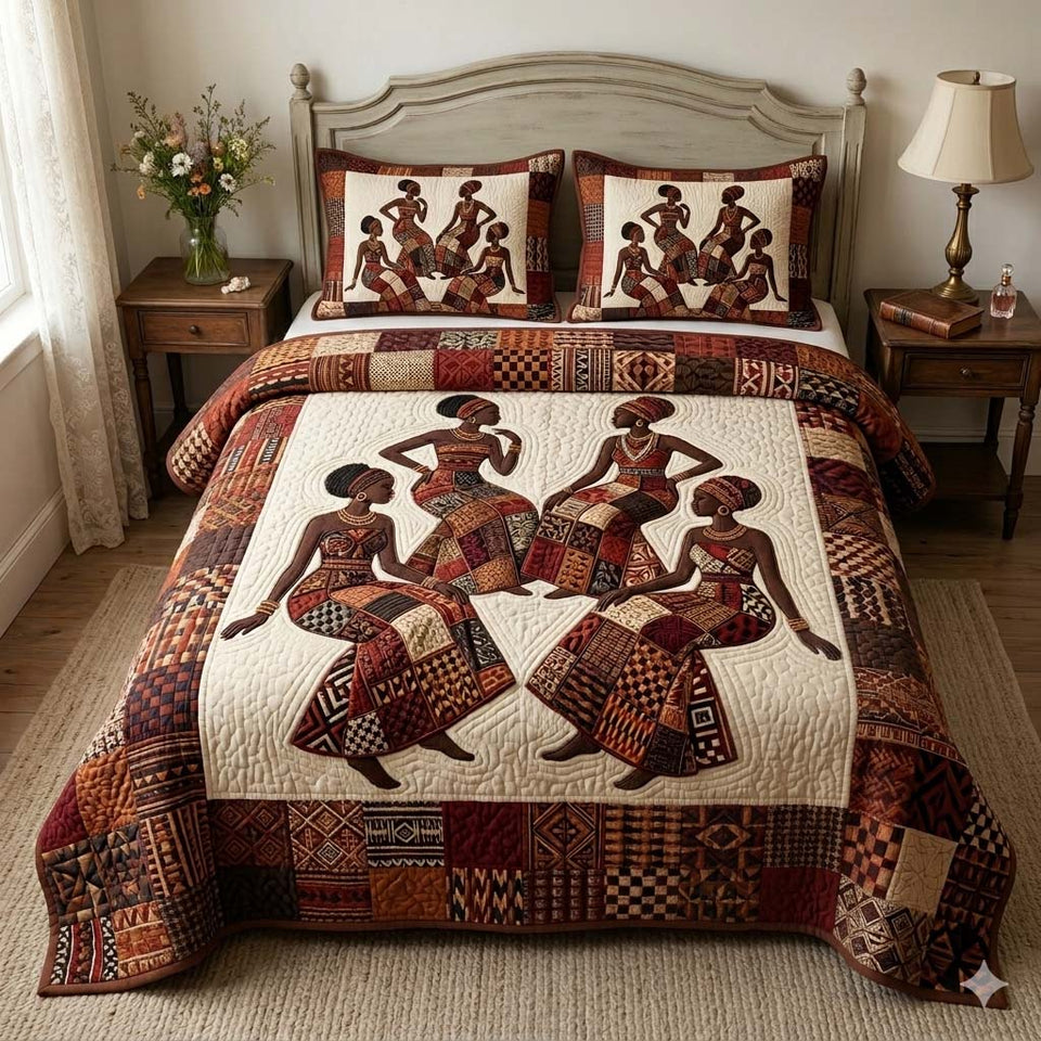 Tribal Dance Sisterhood quilted bedding set, quilt and two pillow shams on a made bed