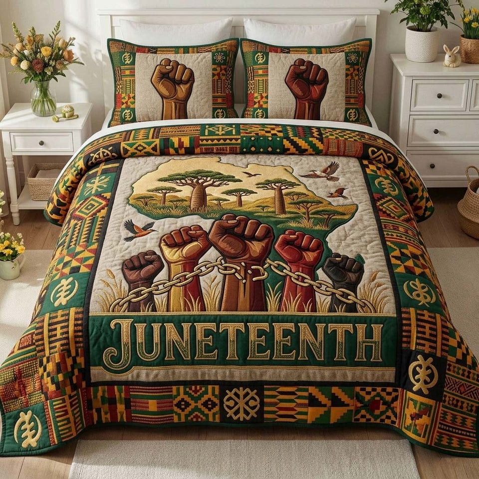Unity Rising quilted bedding set, quilt and two pillow shams on a made bed
