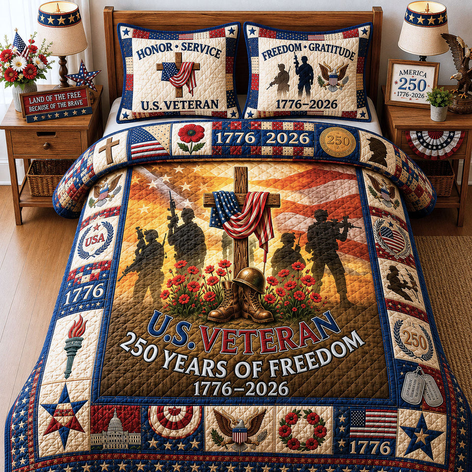 US Veteran Pride quilted bedding set, quilt and two pillow shams on a made bed