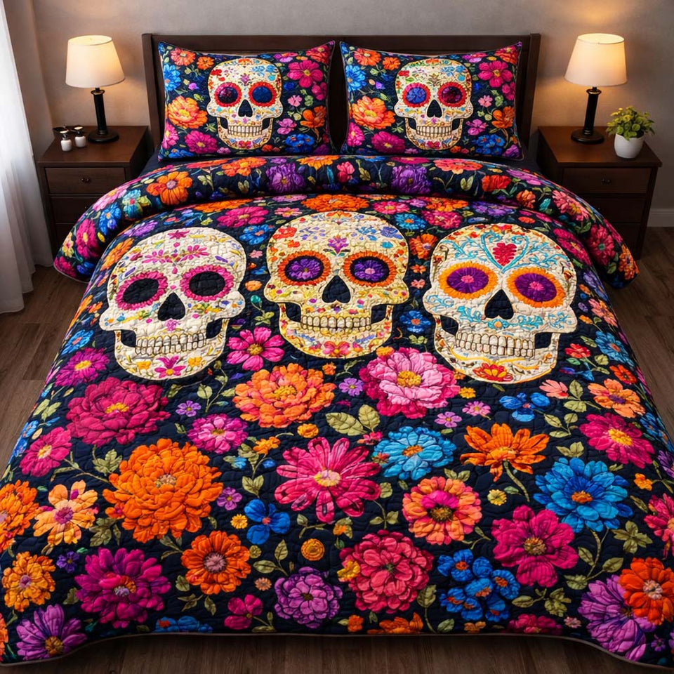 Vibrant Garden Skulls quilted bedding set, quilt and two pillow shams on a made bed