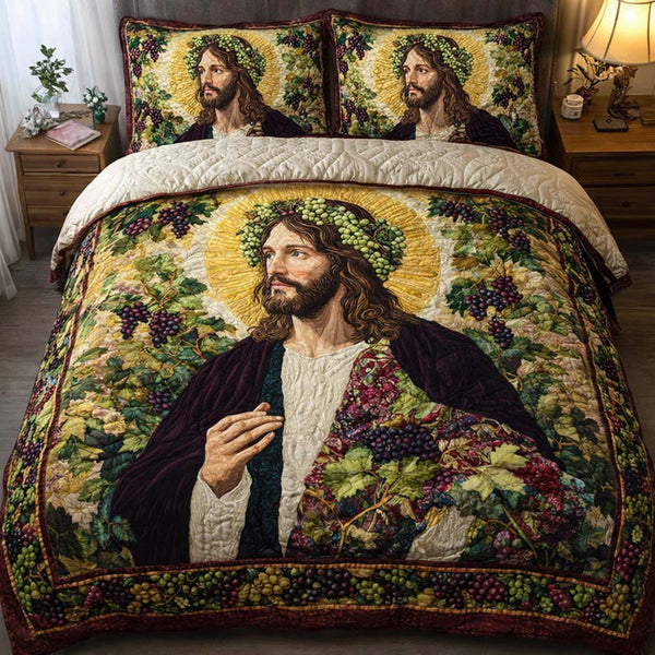 Vineyard Crown quilted bedding set, quilt and two pillow shams on a made bed