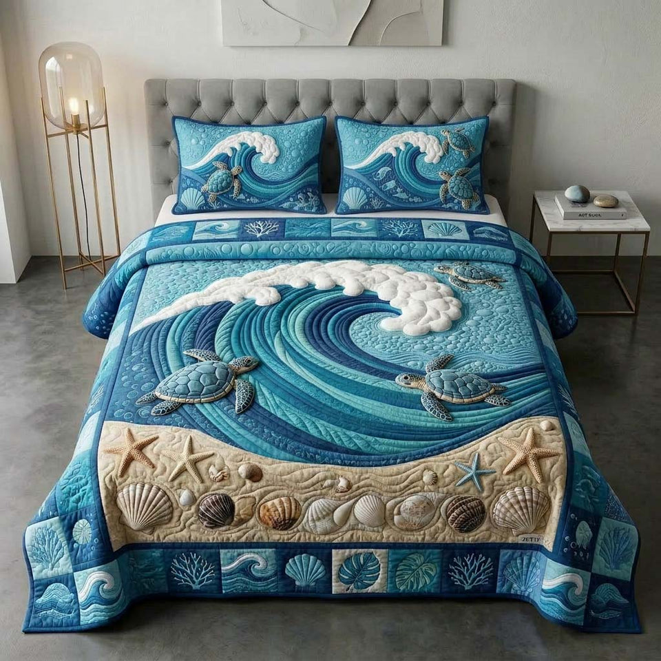 Wave Turtle quilted bedding set, quilt and two pillow shams on a made bed