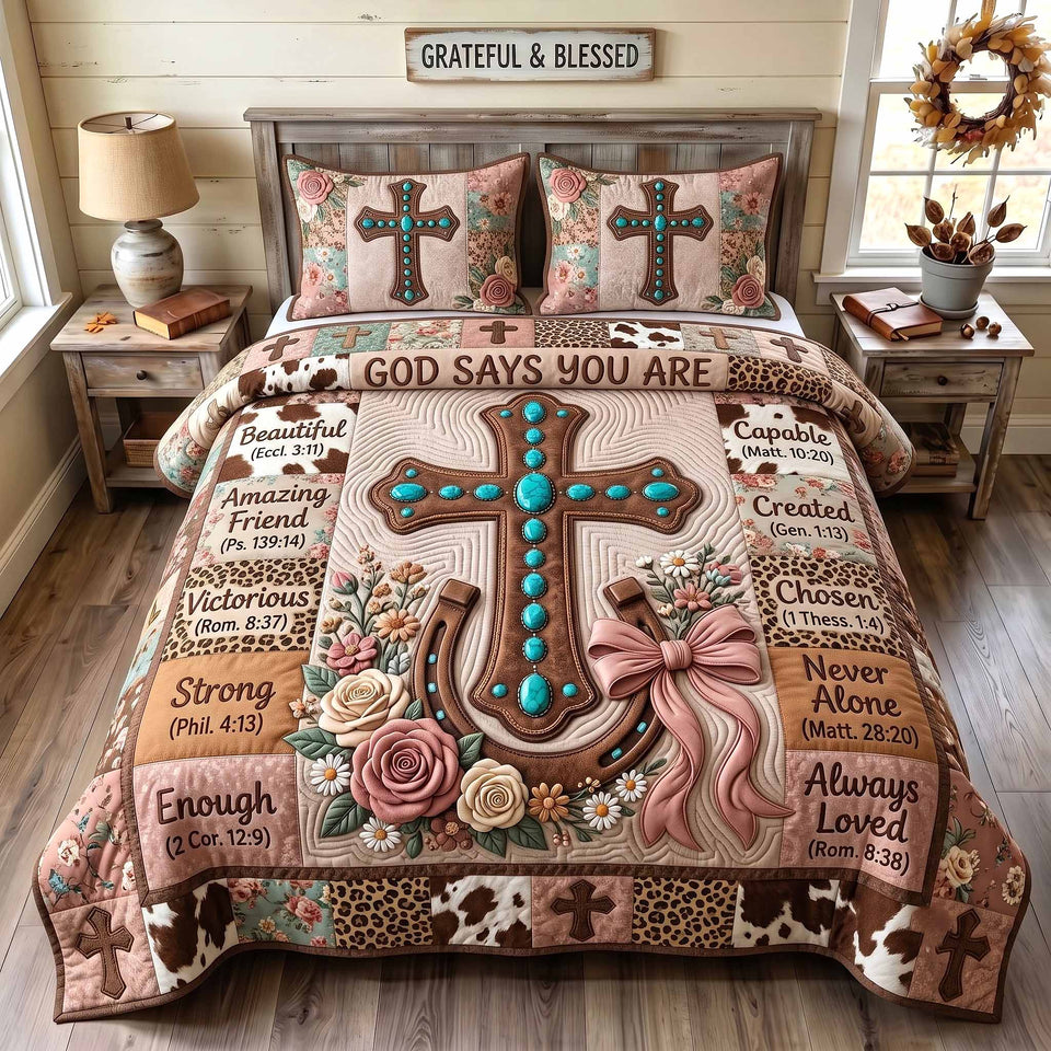 Western Bible Blush Horseshoe And Bow quilted bedding set, quilt and two pillow shams on a made bed