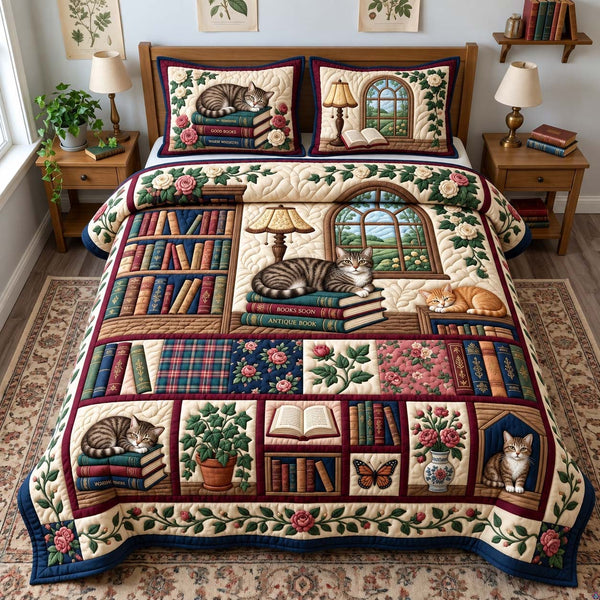 Whiskers And Books quilted bedding set, quilt and two pillow shams on a made bed
