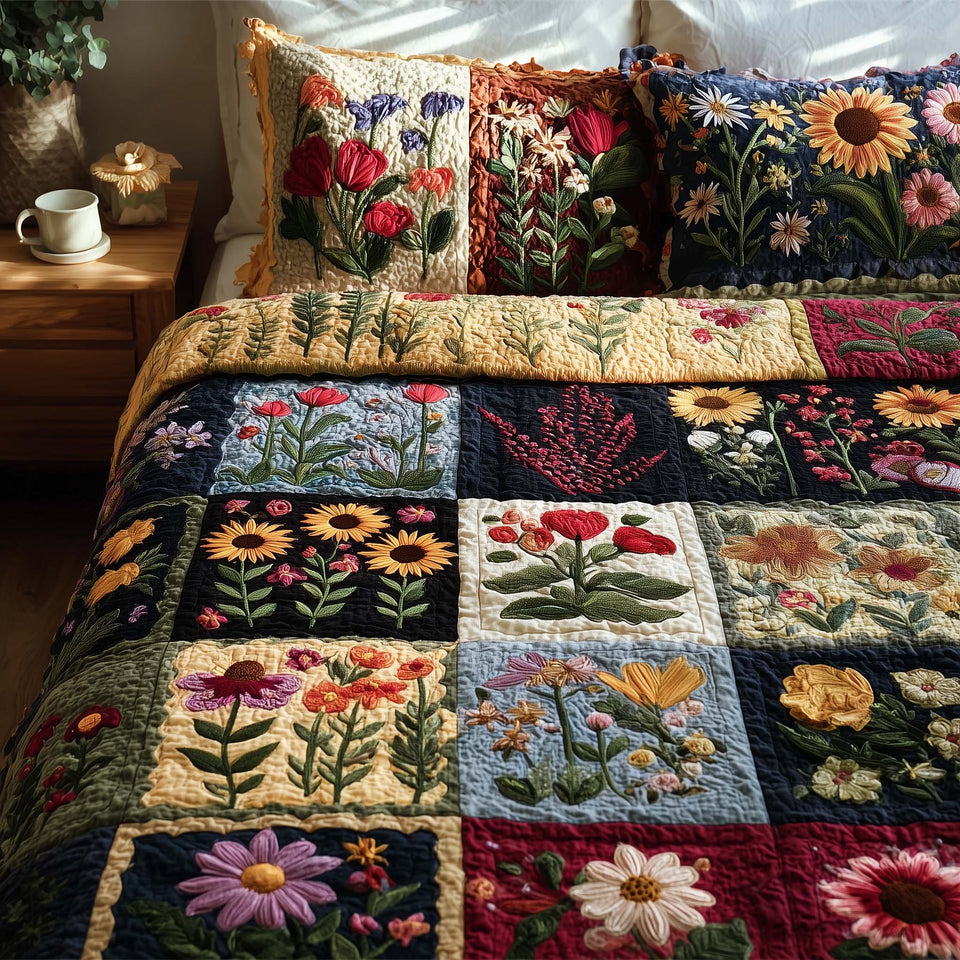 Wild Flora Navy Blocks With Daisies quilted bedding set, quilt and two pillow shams on a made bed