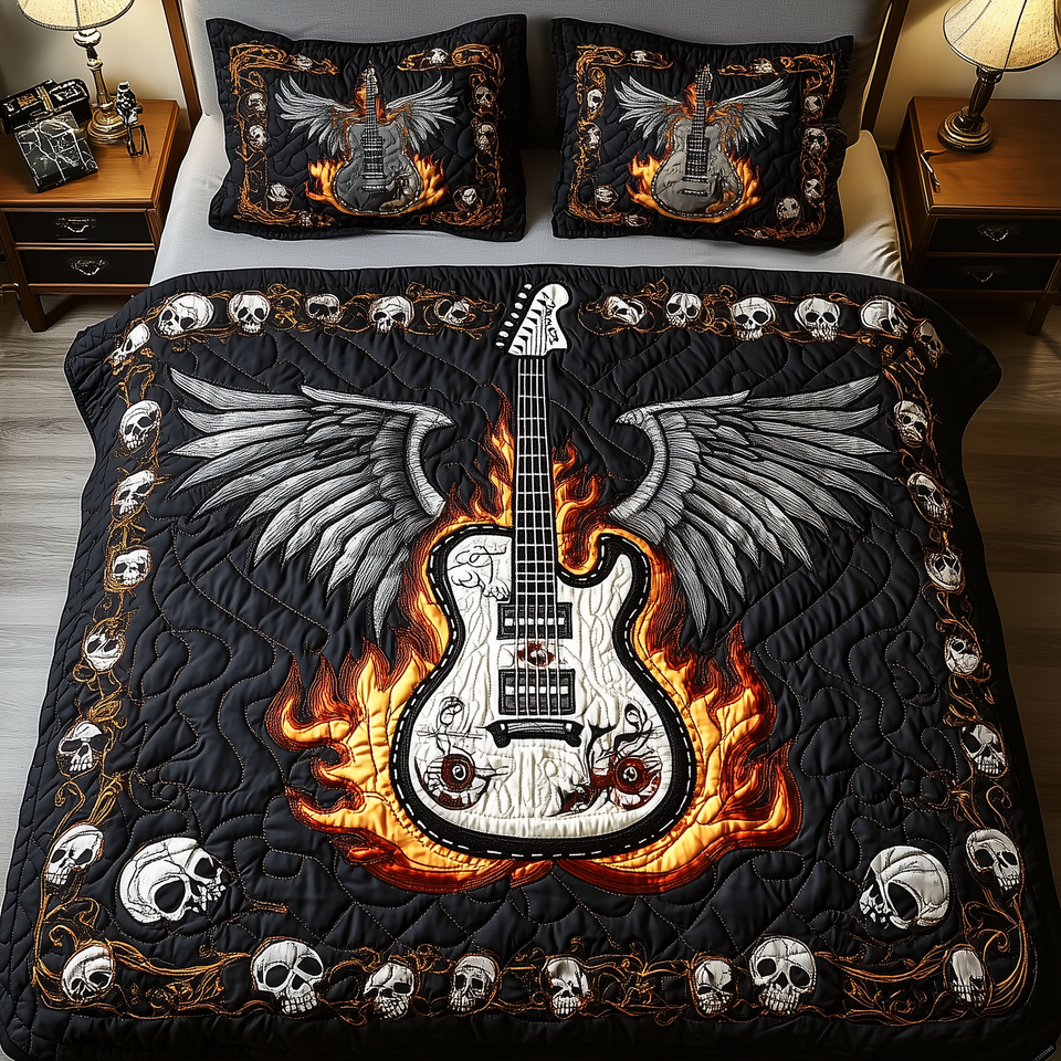 Winged Flame Guitar quilted bedding set, quilt and two pillow shams on a made bed