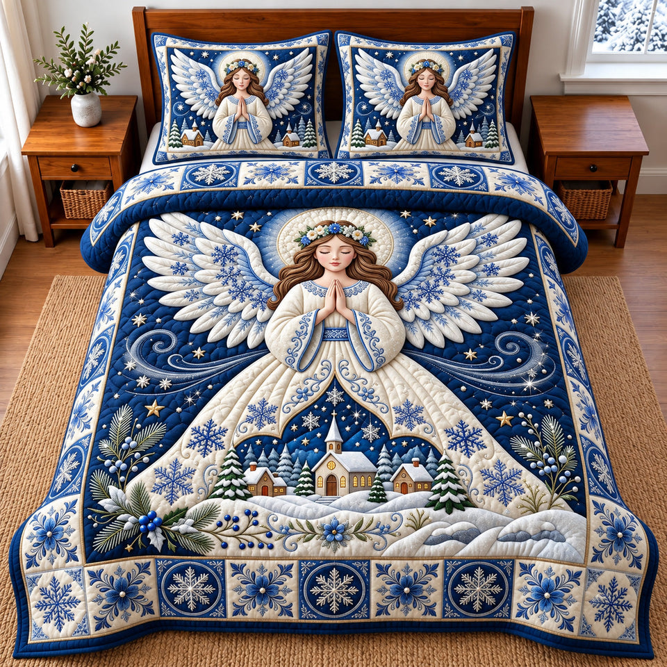 Winter Angel quilted bedding set, quilt and two pillow shams on a made bed