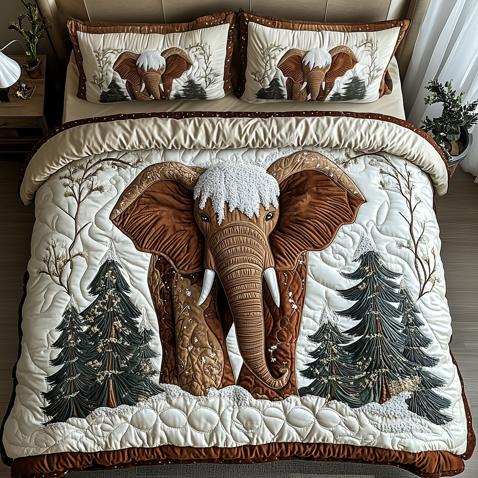 Winter Elephant Snowcap Between Firs quilted bedding set, quilt and two pillow shams on a made bed