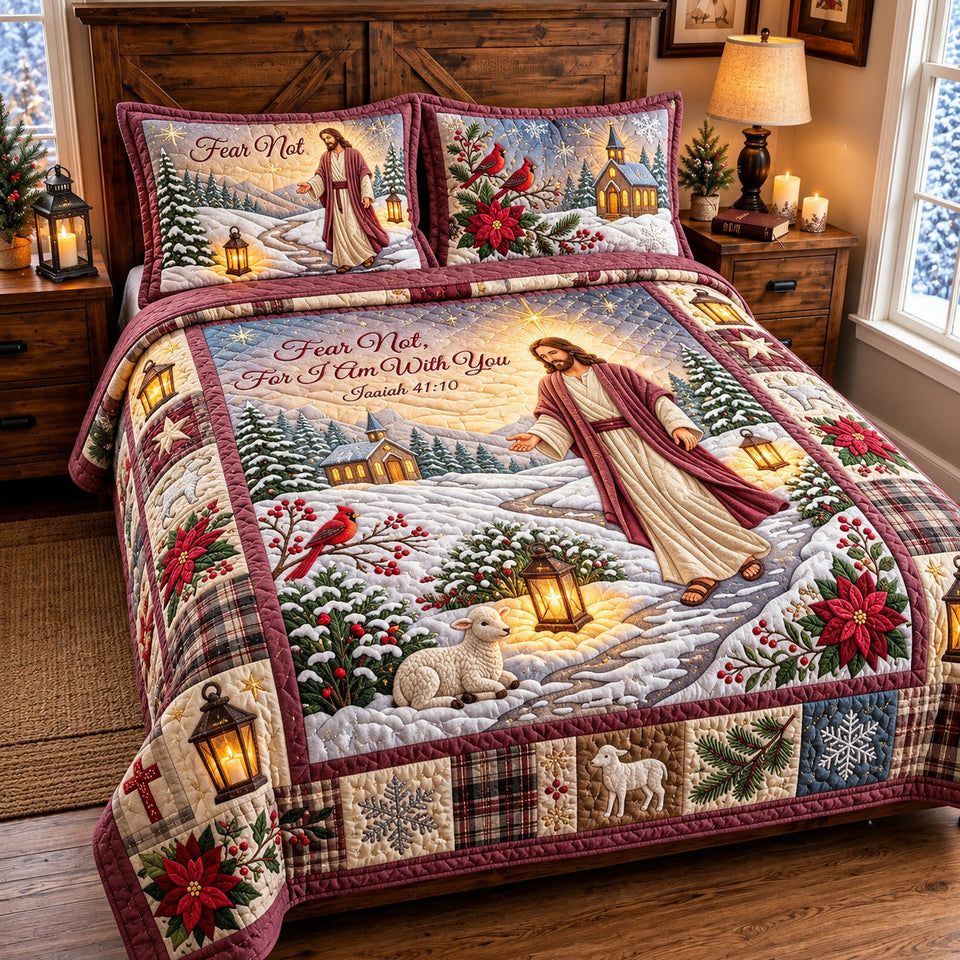 Winter Jesus quilted bedding set, quilt and two pillow shams on a made bed
