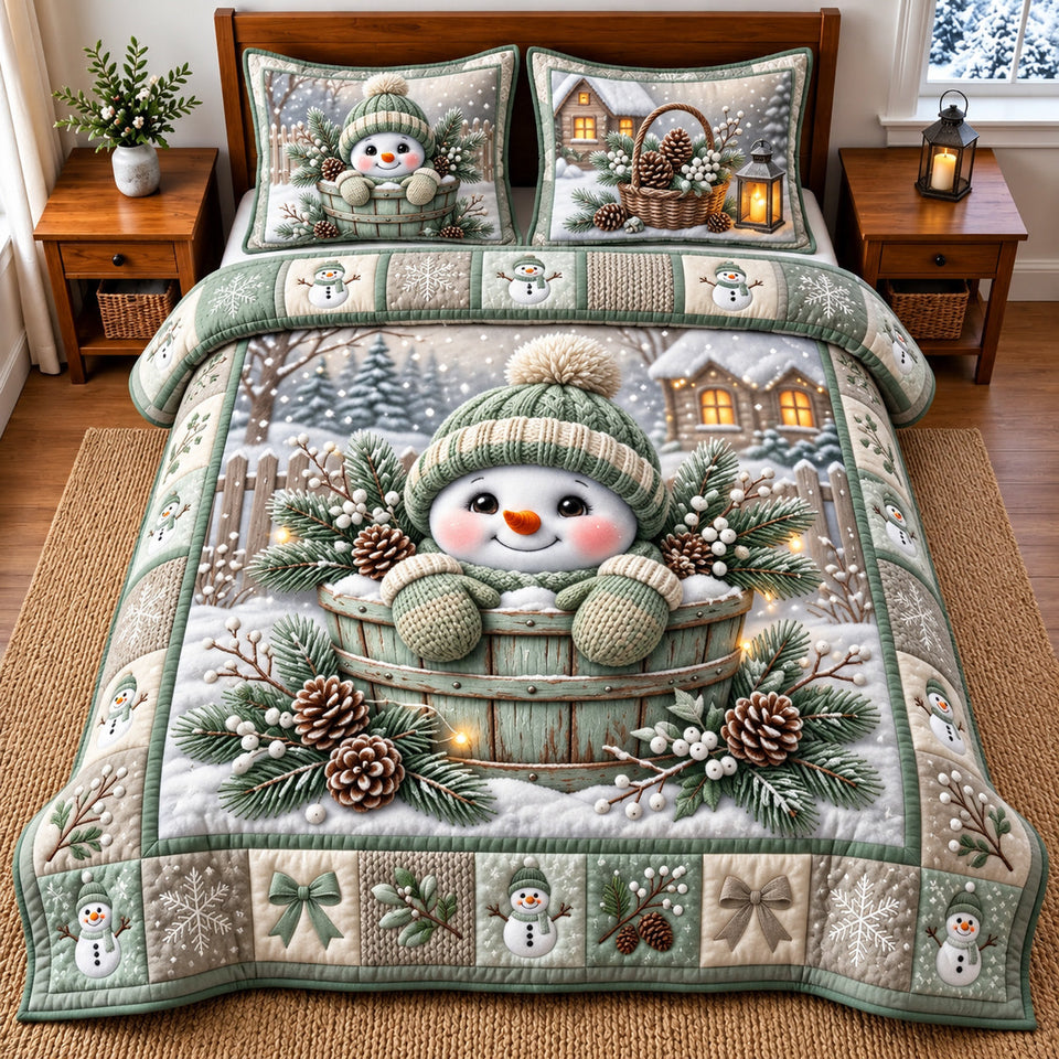 Winter Snowman quilted bedding set, quilt and two pillow shams on a made bed