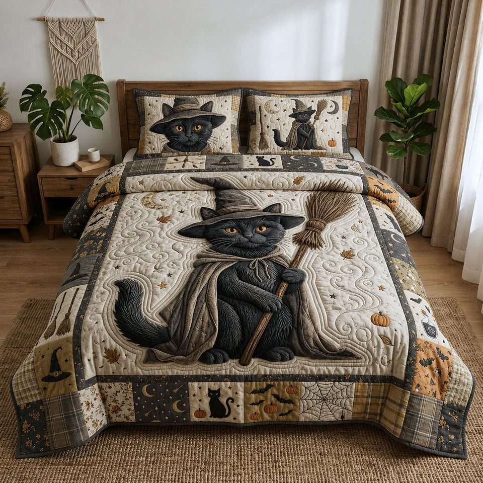 Witchy Black Cat quilted bedding set, quilt and two pillow shams on a made bed