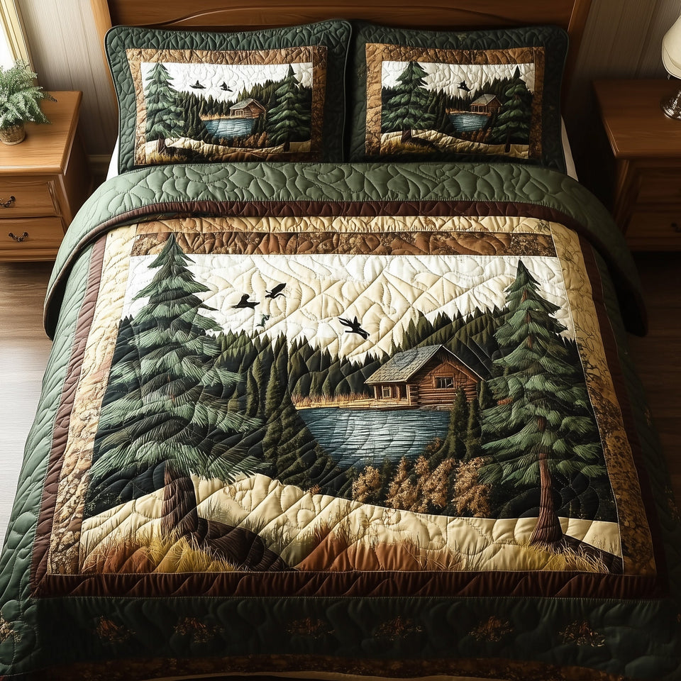 Woodland Lake Hideaway quilted bedding set, quilt and two pillow shams on a made bed